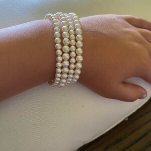 Faux pearl stretch bracelets.